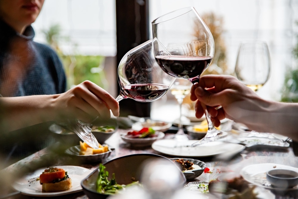 Couple enjoying wine and a great meal at The Kitchen in Chestertown on the Eastern Shore of Maryland